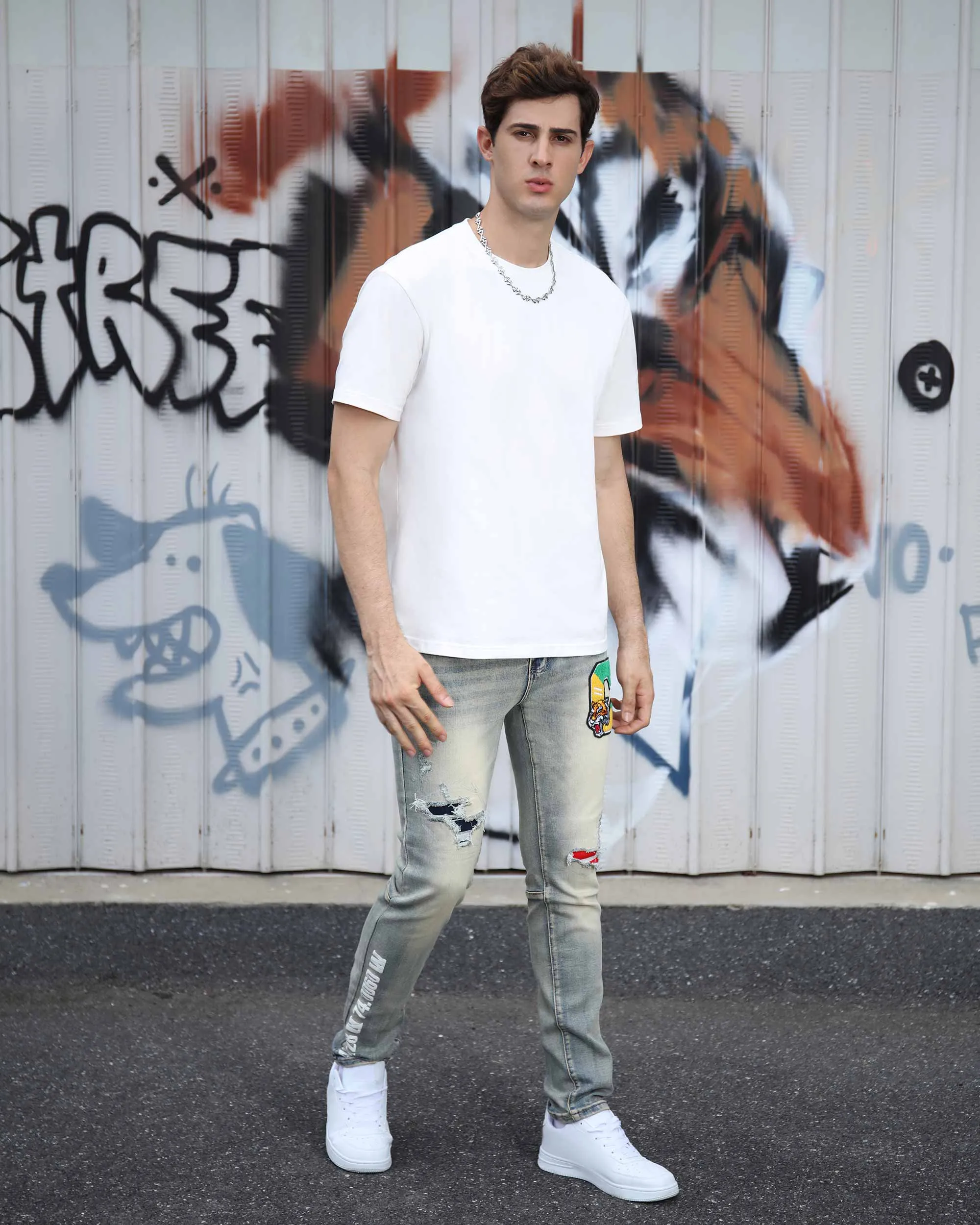 Distressed Light Wash Blue Ripped Jeans with Lion Motif Embroider-Mexico Local Delivery